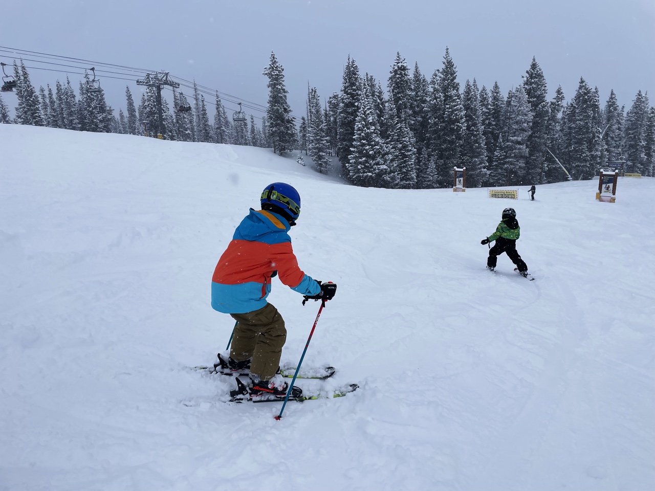 Two kids skiing at Breckenridge Ski Resort, Colorado